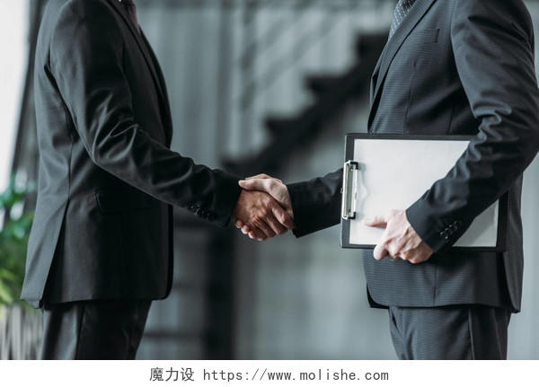商人握手的部分看法签约成功合作合作团结握手企业团结团结人物合作平台商务人士合作握手